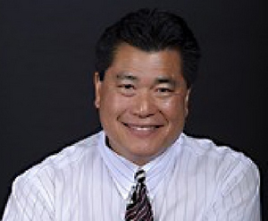 Doctor Roger Chang smiling