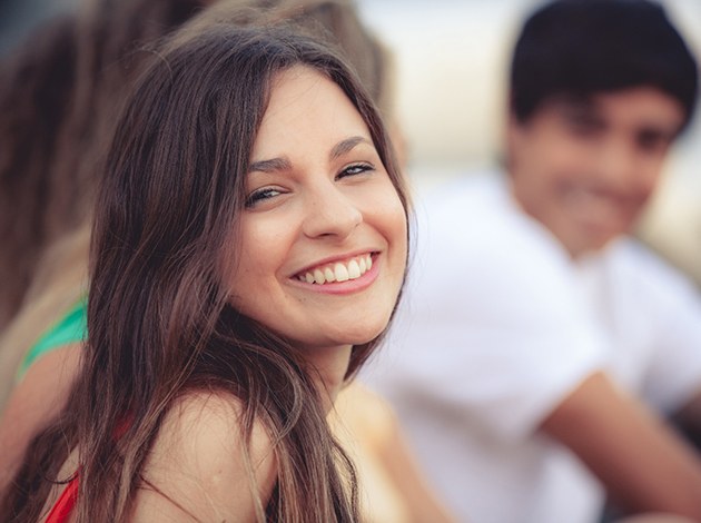 Confident, smiling woman in professional attire